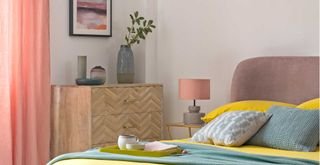 Bedroom with wooden sideboard